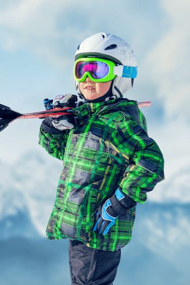 Boy with ski outfit