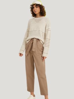 Travel outfits: casual trousers with a light jumper. Travel outfits: casual trousers with a light jumper.