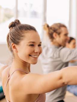 Yoga for beginners - a group in yoga class.