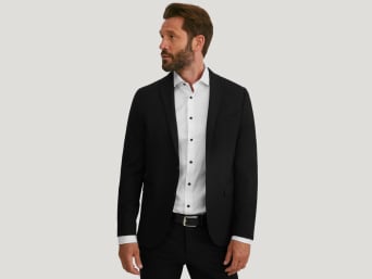 Black suits: a man wearing a black suit. Black suits: a man wearing a black suit.