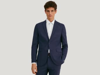Blue suits: a man wearing a blue suit. Blue suits: a man wearing a blue suit.