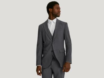 Grey suits: a man wearing a grey suit. Grey suits: a man wearing a grey suit.