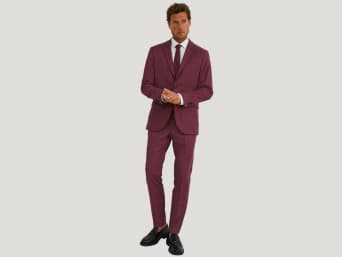 Red suits: a man wearing a red suit. Red suits: a man wearing a red suit.