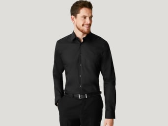 What’s my shirt size: a man wearing a shirt with a good fit. What’s my shirt size: a man wearing a shirt with a good fit.