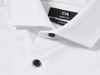 Collar styles: a close-up shot of a cutaway collar shirt. Collar styles: a close-up shot of a cutaway collar shirt.