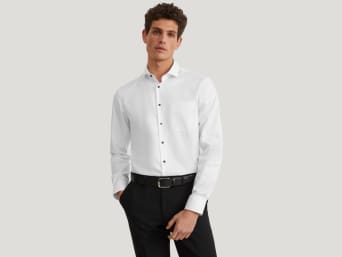 Types of shirts: a man wearing a white business shirt.  Types of shirts: a man wearing a white business shirt.