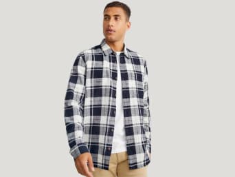 Different types of shirts: a man wearing a casual shirt. Different types of shirts: a man wearing a casual shirt.