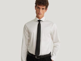 Getting the correct length when tying a tie: how long should a tie be? Getting the correct length when tying a tie: how long should a tie be?