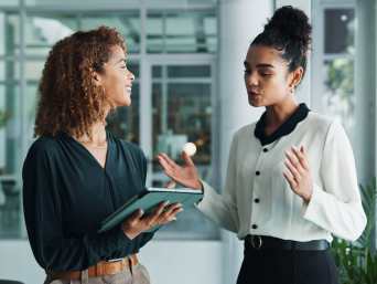 Stylish business dress codes: colleagues wearing a stylish business outfit.  Stylish business dress codes: colleagues wearing a stylish business outfit.