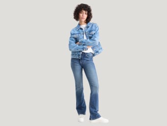 What are bootcut jeans – a woman wearing a pair of bootcut jeans. What are bootcut jeans – a woman wearing a pair of bootcut jeans.