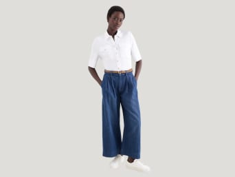 What are wide leg jeans – a woman wearing a pair of wide leg jeans. What are wide leg jeans – a woman wearing a pair of wide leg jeans.