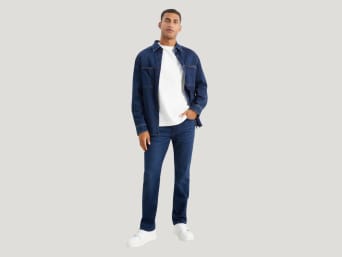 What is a straight fit? – a man wearing a pair of straight fit jeans. What is a straight fit? – a man wearing a pair of straight fit jeans.