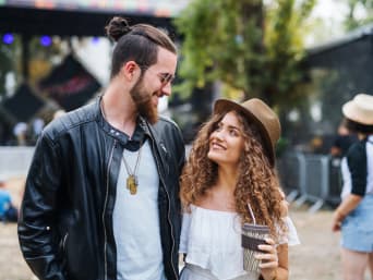 Rock n’ roll men’s festival clothing: a couple at a festival. Rock n’ roll men’s festival clothing: a couple at a festival.