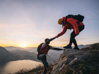 What is functional clothing? Two people hiking up a mountain. What is functional clothing? Two people hiking up a mountain.