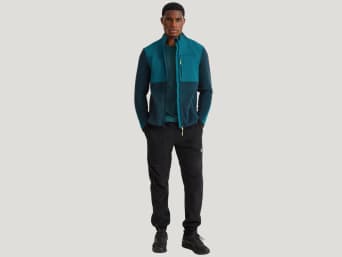 Clothes for hiking: a man wearing weatherproof outdoor clothing. Clothes for hiking: a man wearing weatherproof outdoor clothing.