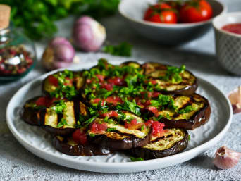 Vegetarian barbecue recipes: grilled aubergine served with a spicy tomato salsa the perfect flavoursome summery dish for a garden party.  Vegetarian barbecue recipes: grilled aubergine served with a spicy tomato salsa the perfect flavoursome summery dish for a garden party.