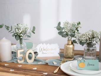 Tischdeko Goldene Hochzeit – Gedeckter Tisch für eine Goldene Hochzeit.