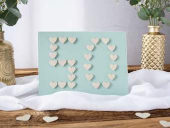 Glückwunschkarte zur Goldenen Hochzeit selbst gestalten – Karte mit einer großen 50 aus Herzen.