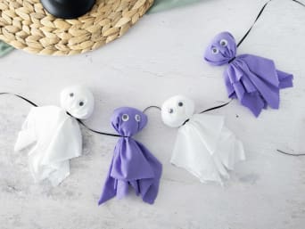 Making homemade Halloween crafts: a finished Halloween themed garland. Making homemade Halloween crafts: a finished Halloween themed garland.