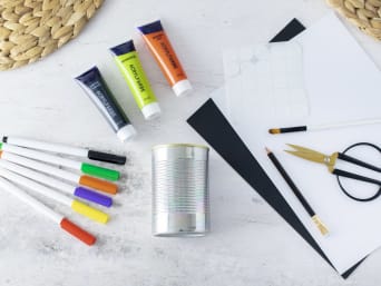 Making Halloween decorations with children: by using some empty tins you can create some spooky monsters or bats. Making Halloween decorations with children: by using some empty tins you can create some spooky monsters or bats.