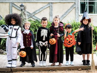 Making Halloween costumes for kids: a group of children wearing different Halloween costumes.  Making Halloween costumes for kids: a group of children wearing different Halloween costumes.
