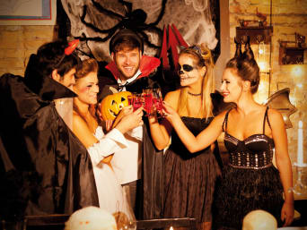 Easy Halloween costumes: a group of party guests wearing different Halloween costumes.  Easy Halloween costumes: a group of party guests wearing different Halloween costumes.