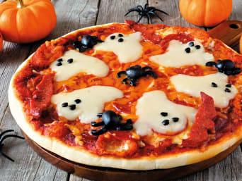 Halloween recipe for a spooky ghost pizza. Halloween recipe for a spooky ghost pizza.
