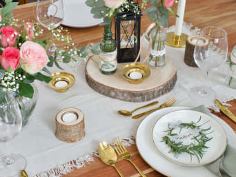 DIY wedding table decorations: a decorated table at a wedding.  DIY wedding table decorations: a decorated table at a wedding.