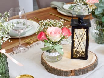 Homemade wedding decorations: wedding decorations on a table with a lantern. Homemade wedding decorations: wedding decorations on a table with a lantern.