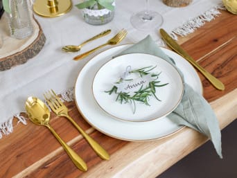 Making your own wedding decorations: a rosemary branch with a place card. Making your own wedding decorations: a rosemary branch with a place card.