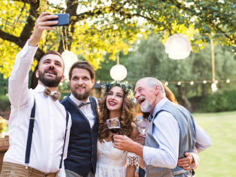 What to wear to a wedding?: casually dressed wedding guests with the bride and groom. What to wear to a wedding?: casually dressed wedding guests with the bride and groom.
