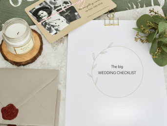 How to plan a wedding: a checklist and a wedding invitation on a table. How to plan a wedding: a checklist and a wedding invitation on a table.