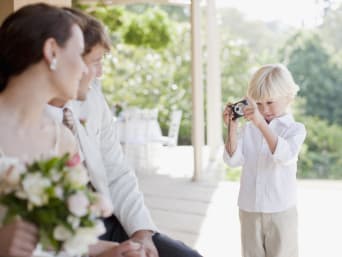 Wedding game ideas:  a boy taking part in a wedding scavenger hunt. Wedding game ideas:  a boy taking part in a wedding scavenger hunt.