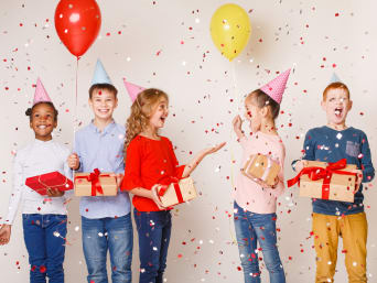 Children's gifts: a group of children enjoy their gifts. Children's gifts: a group of children enjoy their gifts.