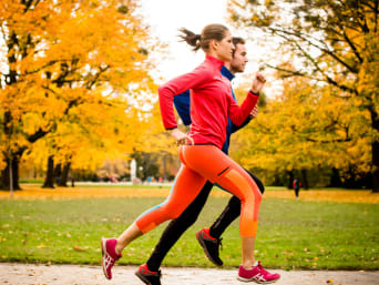 Is jogging good for you? Running partners jogging through a park together. Is jogging good for you? Running partners jogging through a park together.