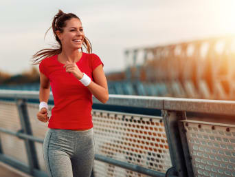 The absolute essentials for runners:  a woman going for a jog in sportswear. The absolute essentials for runners:  a woman going for a jog in sportswear.