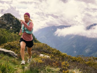 Trail running tips: a runner training in the mountains. Trail running tips: a runner training in the mountains.