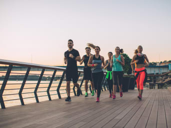 Running plan for beginners: a group of runners jogging together. Running plan for beginners: a group of runners jogging together.