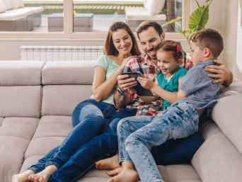 Digital parenting: Family explores digital media together. Digital parenting: Family explores digital media together.
