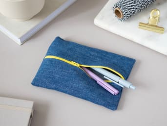 Upcycling clothes without a sewing machine: making a handmade pencil case from an old pair of jeans. Upcycling clothes without a sewing machine: making a handmade pencil case from an old pair of jeans.