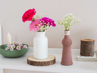 Quick gift for mum - Trash to Terracotta vases with flowers. Quick gift for mum - Trash to Terracotta vases with flowers.