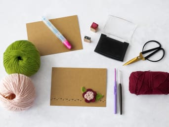 Materials for the crocheted Mother's Day card. Materials for the crocheted Mother's Day card.