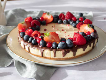 Bake a Mother's Day cake: homemade cheesecake on a plate. Bake a Mother's Day cake: homemade cheesecake on a plate.