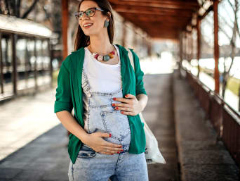Maternity styles: a mum-to-be wearing a stylish outfit. Maternity styles: a mum-to-be wearing a stylish outfit.