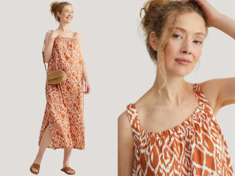 Fashion for pregnancy: a pregnant woman wearing a printed dress. Fashion for pregnancy: a pregnant woman wearing a printed dress.