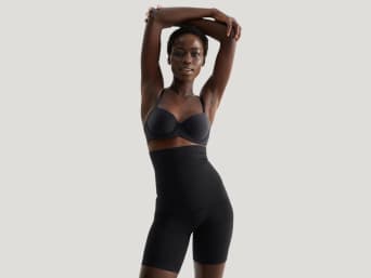 Tummy control underwear: a woman wearing shaping underwear. Tummy control underwear: a woman wearing shaping underwear.