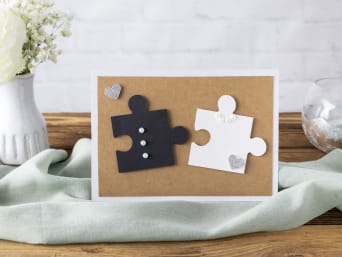 Silver wedding anniversary cards: greeting card with puzzle pieces. Silver wedding anniversary cards: greeting card with puzzle pieces.