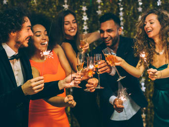 New Year's Eve snacks - party guests celebrating New Year's Eve. New Year's Eve snacks - party guests celebrating New Year's Eve.