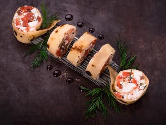 Cold New Year's Eve snacks - savoury pancakes with a cream cheese and salmon filling. Cold New Year's Eve snacks - savoury pancakes with a cream cheese and salmon filling.