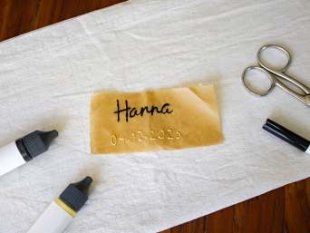 Christening candle: a label inscribed with candle pens. Christening candle: a label inscribed with candle pens.